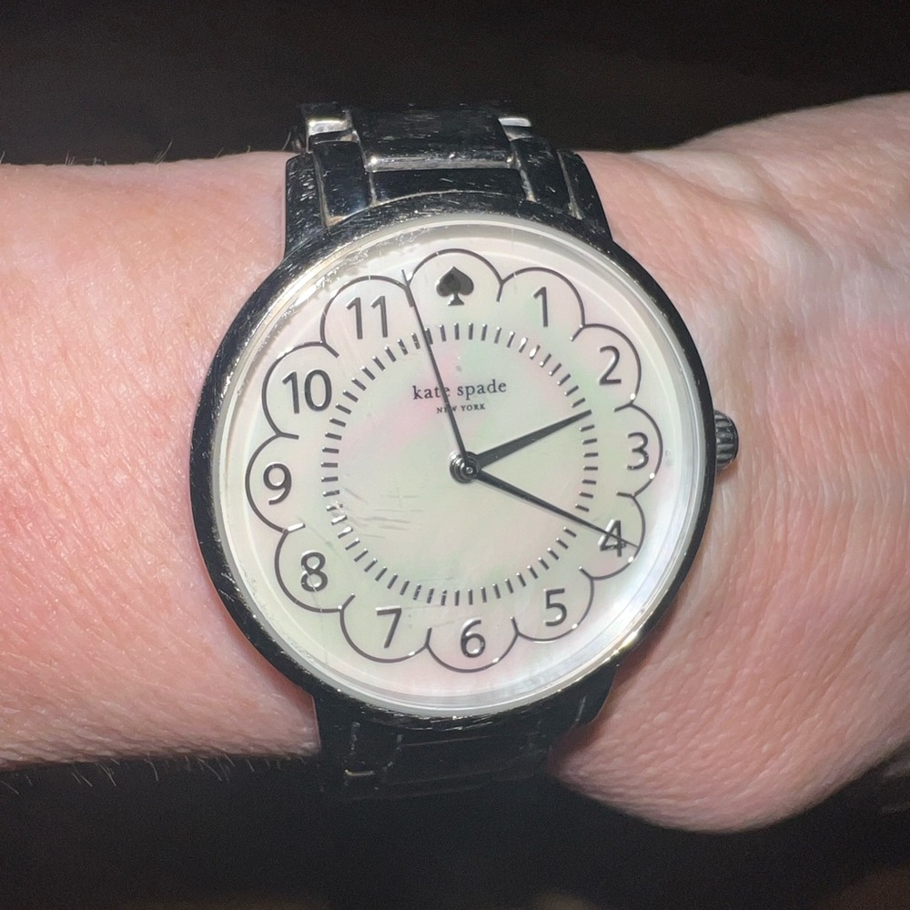 Kate Spade stainless steel adjustable watch with mother of pearl face